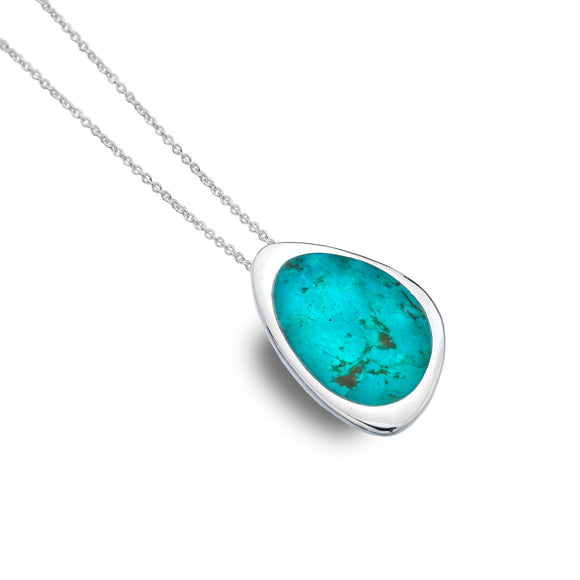 Organic shape turquoise pendant